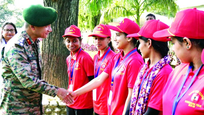 Army officer interacting with children, before flagging off a NIT in Kathua.