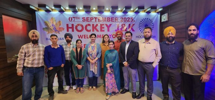 Newly elected officials of Hockey J&K posing for a group photograph.