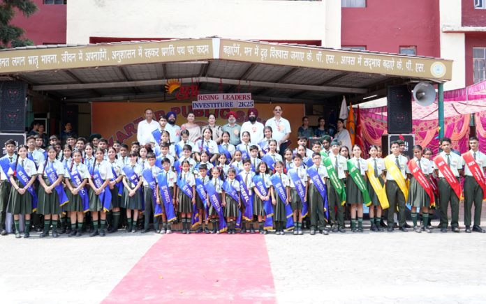 Student leaders posing with guests during a function at KPS Barnoti, Kathua.
