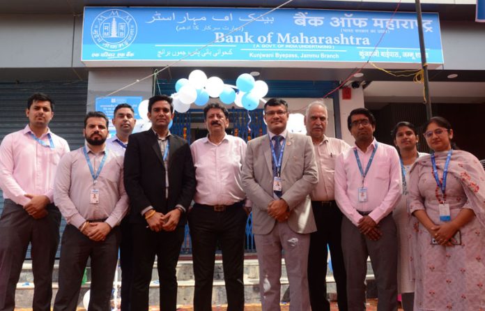 Officials of Bank of Maharashtra posing for a group photograph after inaugurating new branch in Jammu.