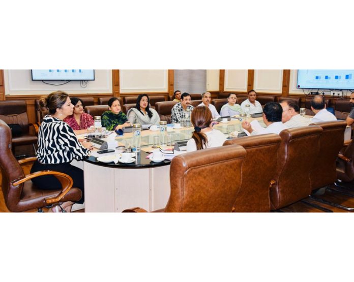 Comm Secy YSS Yasha Mudgal reviewing functioning of department in a meeting at Jammu on Wednesday.