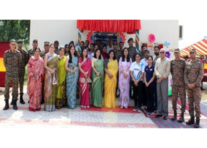 Chairperson FWO Strike 36 Deepali Kamatnurkar, Army officers and teachers of APS Sunjuwan posing together after inauguration of Indoor Shooting Hall of the School.