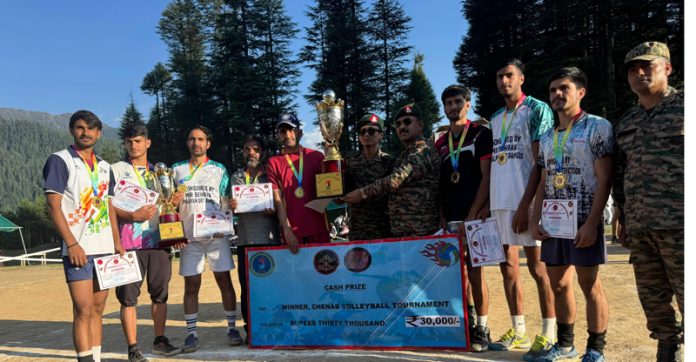 Army officers presenting trophy to winning team during closing ceremony.
