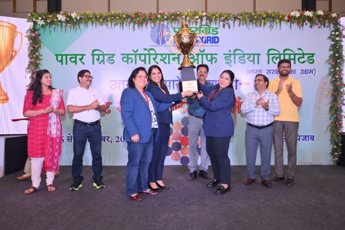 Winners posing along with trophy during closing ceremony at Amritsar.