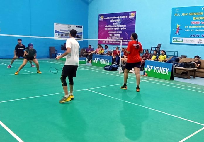 Players in action during a mix doubles match at Jammu. Players in action during a mix doubles match at Jammu.
