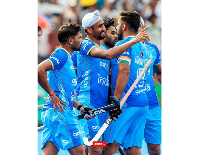 Indian hockey team after settling for a draw match against Korea.