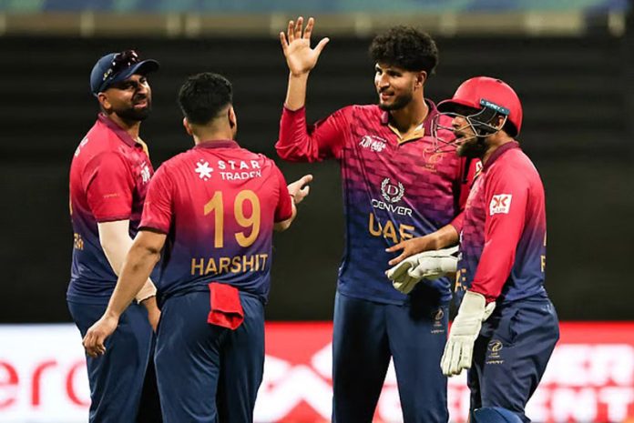 UAE players celebrating after beating Oman in Asia Cup match on Monday. UAE players celebrating after beating Oman in Asia Cup match on Monday.