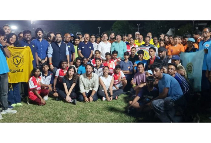 Volleyball players posing along with dignitaries. Volleyball players posing along with dignitaries.