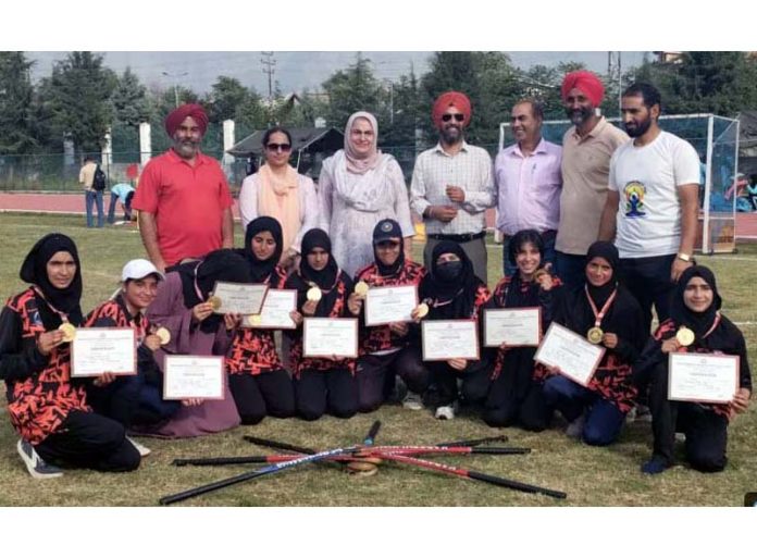 Players posing along with dignitaries.