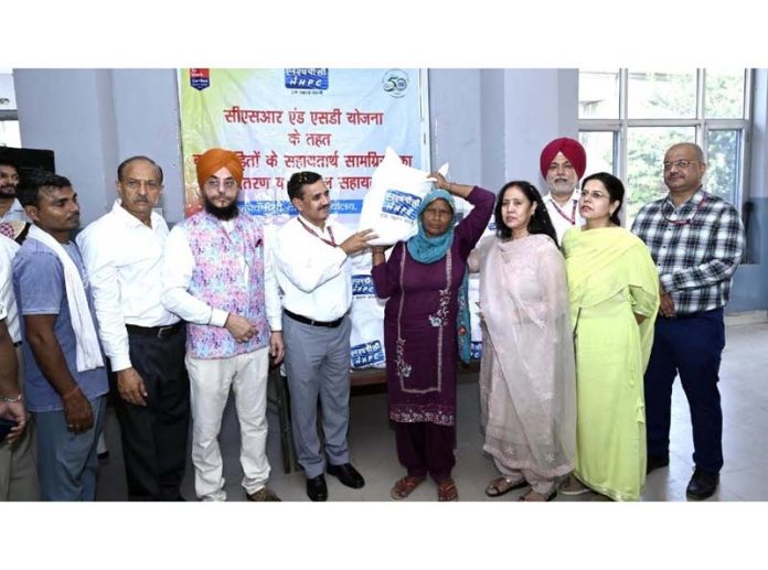 Ram Swaroop, Executive Director NHPC posing along with others during a camp in Jammu.
