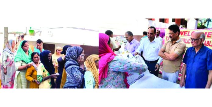 The members of TRG Trust distributing relief during a camp in Jammu. The members of TRG Trust distributing relief during a camp in Jammu.