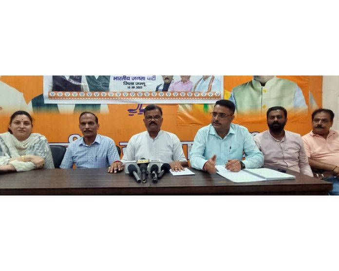 Jammu district BJP leaders at a press conference on Friday.
