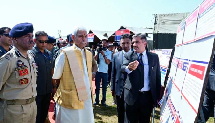 Lieutenant Governor being briefed during exhibition on 'New Criminal Laws' at Srinagar on Thursday.