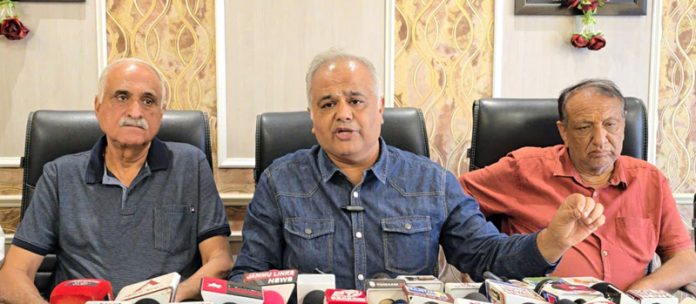 President TFW, Deepak Gupta addressing press conference in Jammu. -Excelsior/Rakesh President TFW, Deepak Gupta addressing press conference in Jammu. -Excelsior/Rakesh