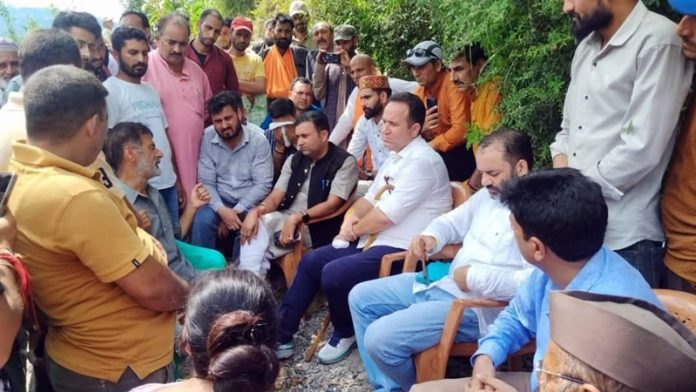 Leader of Opposition, Sunil Sharma with cloudburst hit victims of Rajgarh in Ramban district on Friday. Leader of Opposition, Sunil Sharma with cloudburst hit victims of Rajgarh in Ramban district on Friday.