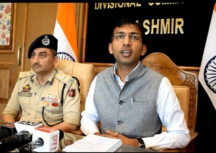 Div Com Kashmir and IGP Traffic addressing press conference at Srinagar on Monday.