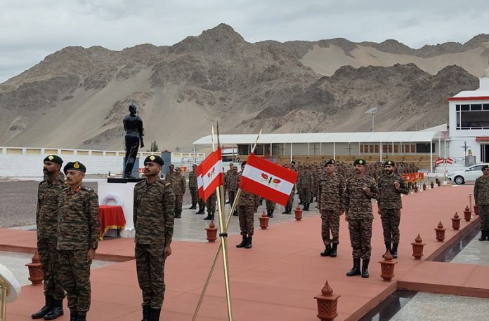 Army officers paying tribute to fallen soldiers during celebration of 26th Raising Day of Fire and Fury Corps in Leh on Monday.