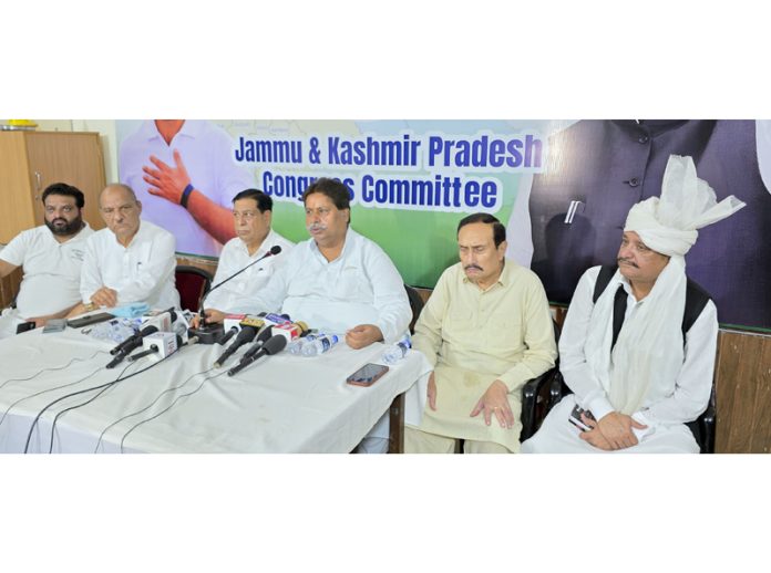 JKPCC working president Raman Bhalla and others during a press conference in Jammu. -Excelsior/Rakesh