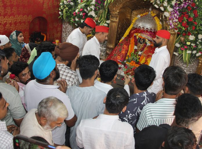 Devotees paying obeisance at Bawe Wali Mata temple in Jammu on first Navratra. — Excelsior/Rakesh