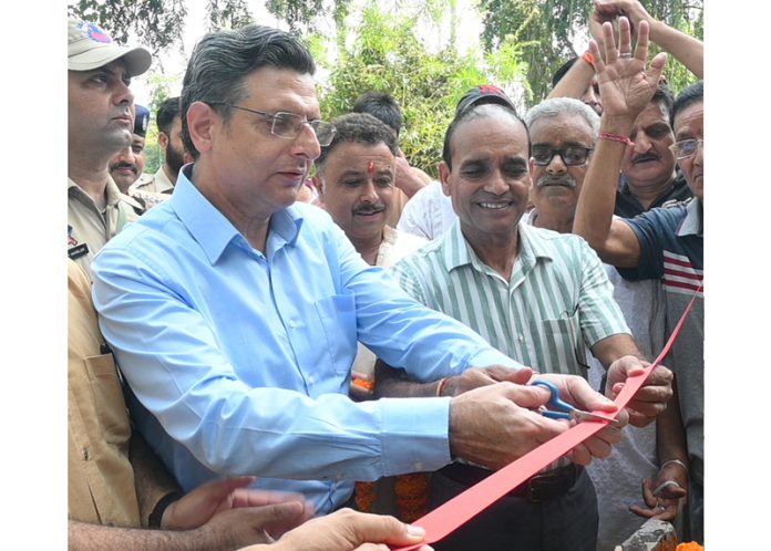 Relief & Rehabilitation Commissioner inaugurating a work at Jagti Migrant Township on Wednesday.