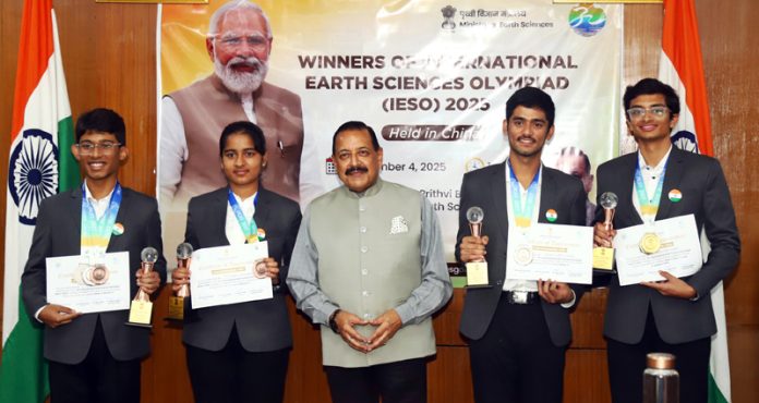 Union Minister Dr Jitendra Singh posing for photograph with Indian team's Medal winning school students at Union Minister Dr Jitendra Singh posing for photograph with Indian team's Medal winning school students at