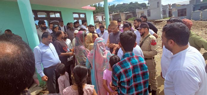 BJP Rajya Sabha MP Gulam Ali Khatana interacting with flood victims.