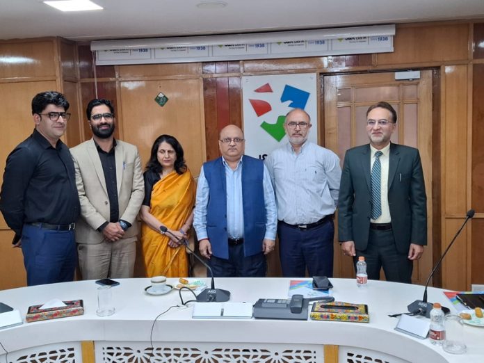 Sudhir Gupta, Executive Director JKBFSL posing along with others during a function on Tuesday.