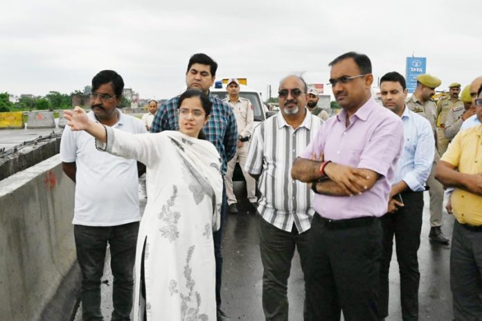 Divisional Commissioner during visit to flood affected area of Samba.