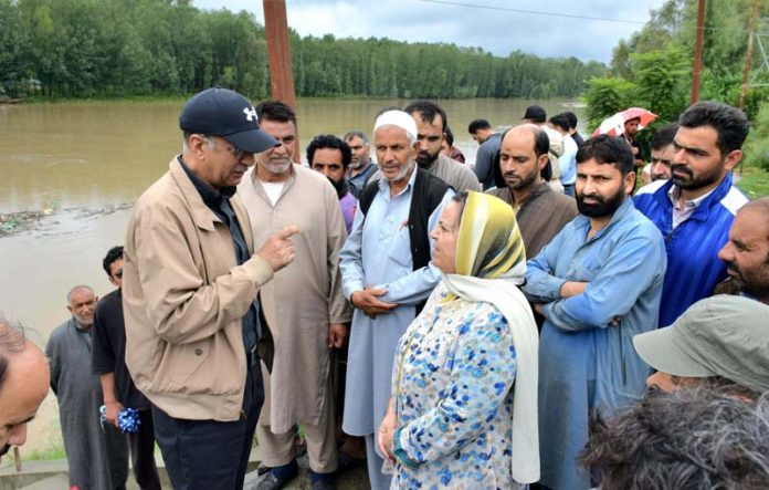 Minister Sakeena Itoo and Advisor to CM taking stock of flood situation in Anantnag.