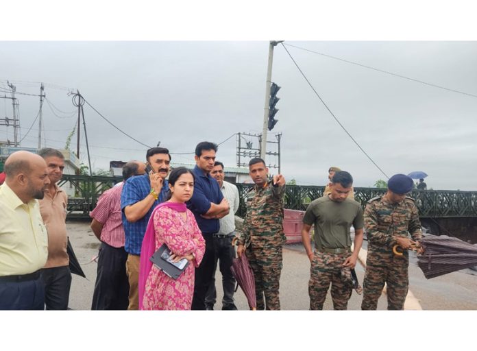 DC Jammu reviewing restoration work on Tuesday.