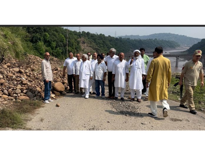 Former minister Ajay Kumar Sadhotra assessing damages due to recent rains and flood in Nagrota Assembly Constituency.