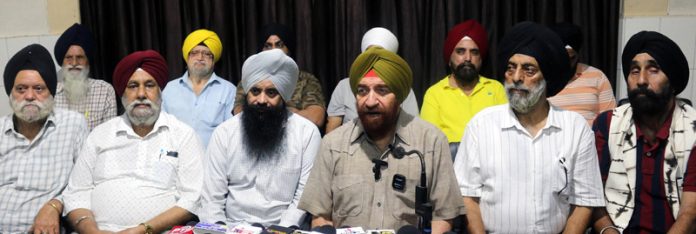 SUF chairman S S Wazir & others addressing press conference in Jammu. -Excelsior/Rakesh