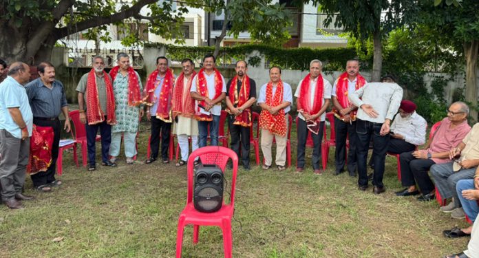 Elected members of the newly formed Association of Civilian Residents of Sainik Colony posing together during meeting. Elected members of the newly formed Association of Civilian Residents of Sainik Colony posing together during meeting.