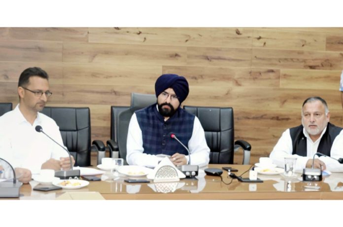 DC Doda chairing a meeting on Tuesday.