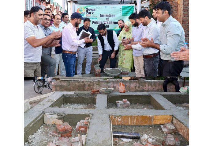 DC Srinagar initiating work on public toilet complex on Friday. DC Srinagar initiating work on public toilet complex on Friday.