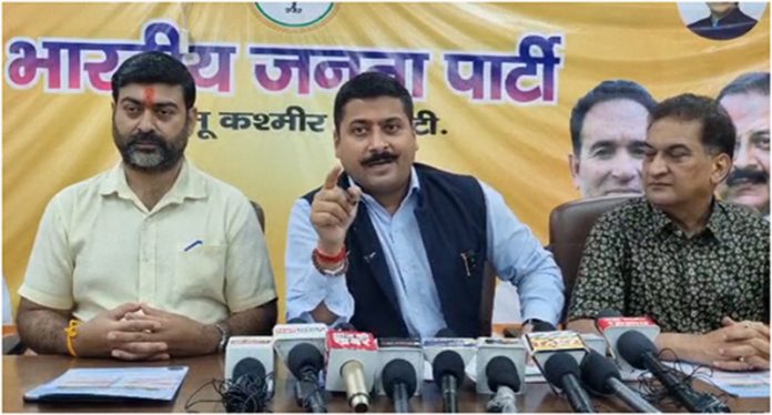 BJP spokespersons, Gaurav Gupta and Balbir Ram Rattan and media in charge, Dr Parfeep Mahotra at a press conference at Jammu on Thursday.