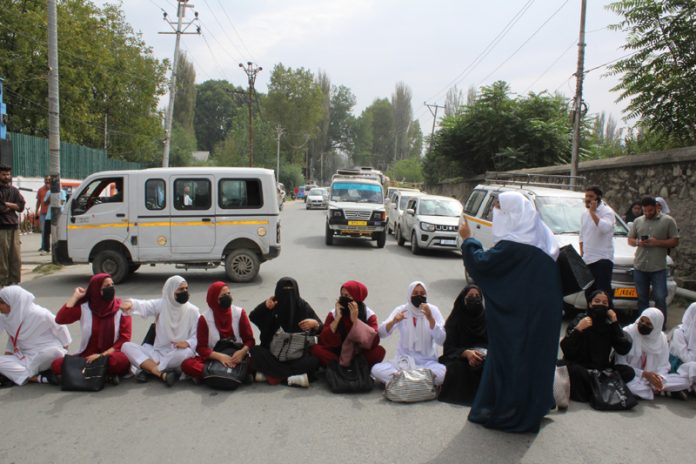 Students of St. Joseph Nursing Institute during a protest in north Kashmir’s Baramulla . -Excelsior/Aabid Nabi
