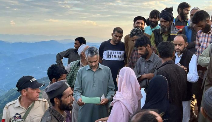 NC MLA from Budhal Javed Choudhary meeting people who suffered damage in floods on Sunday. NC MLA from Budhal Javed Choudhary meeting people who suffered damage in floods on Sunday.