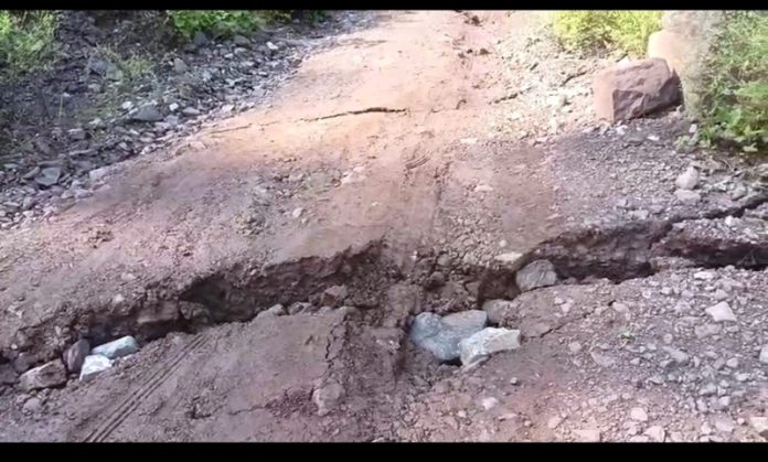 Cracks visible as the land sinking hit Tangar area in Ramban district. -Excelsior/Parvez Mir