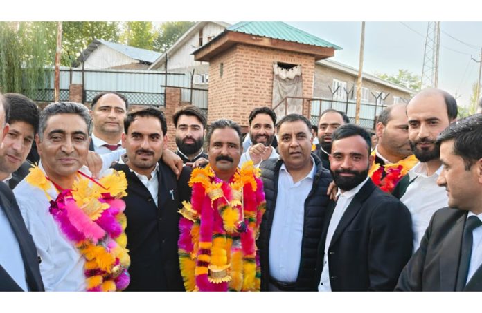 Advocate Junaid Ahmad Bhat posing after his win as president of the Bar Association Pulwama.