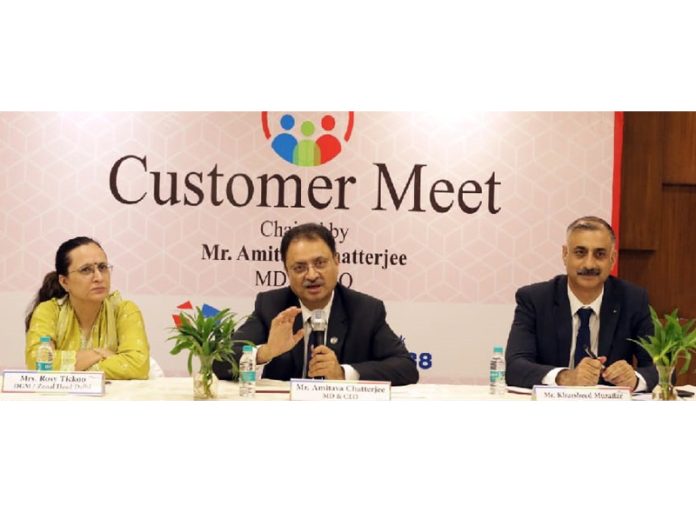 J&K Bank MD & CEO Amitava Chatterjee interacting with the customers in Noida on Thursday.