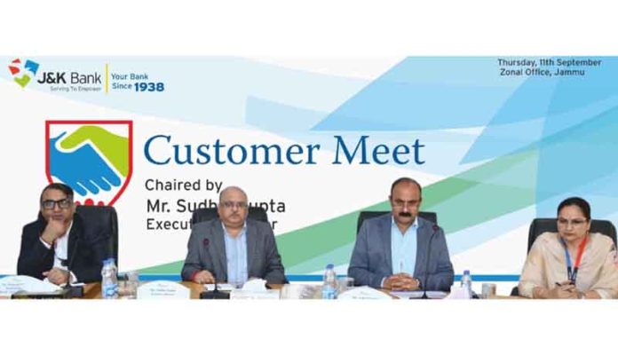 Dignitaries from J&K Bank chairing customer meet in Jammu on Thursday.