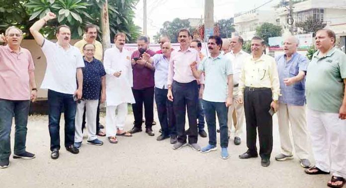 Residents of Trikuta Nagar raising slogans during a protest demonstration in Jammu on Thursday. Residents of Trikuta Nagar raising slogans during a protest demonstration in Jammu on Thursday.