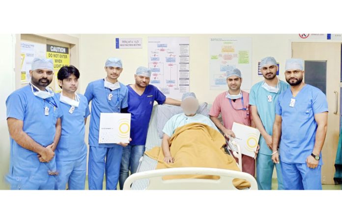 A team of doctors posing with a patient on whom they performed IVL-assisted angioplasty at SMVDNSH, Katra. A team of doctors posing with a patient on whom they performed IVL-assisted angioplasty at SMVDNSH, Katra.