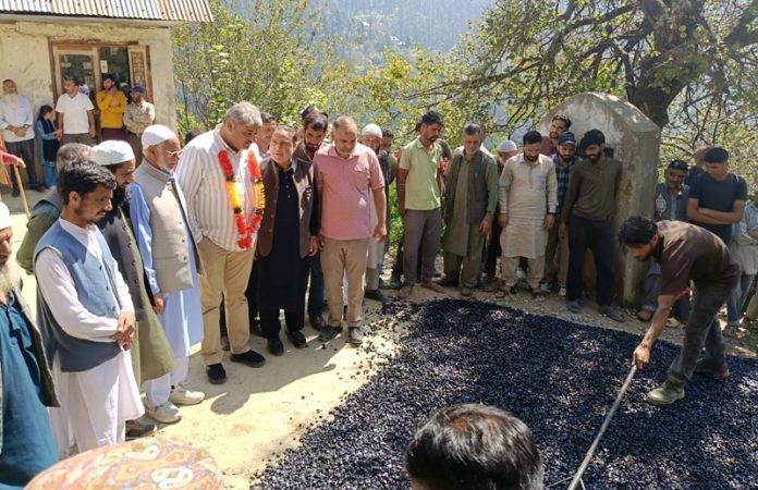 MLA Banihal Sajjad Shaheen kick-starting black-topping work of a road in his constituency.