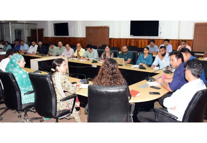 DC Jammu Dr Rakesh Minhas chairing a meeting on Wednesday.