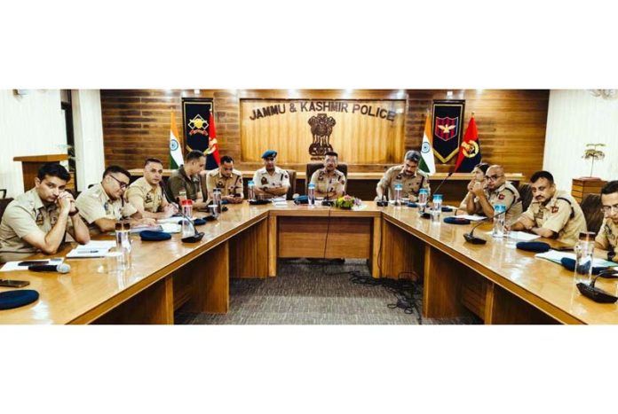 SSP Jammu, Joginder Singh, chairing a meeting of police officers at DPL Jammu on Sunday.