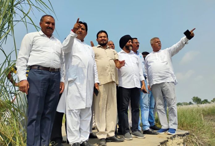 Jat Sabha members during visit to flood hit areas of Vijaypur on Tuesday.