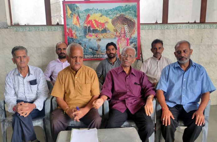 Office bearers of Baba Bhair Dev Sathan Trust during a meeting at Dogra Brahman Pratinidhi Sabha, Parade.