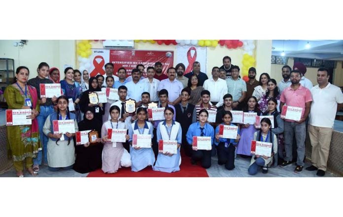 Winners and participants of JKBOSE organised UT level quiz competition on HIV/AIDS.